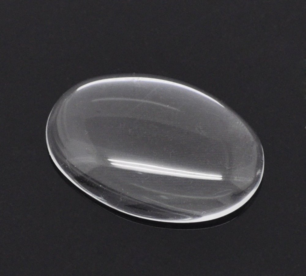 Oval cabochon 18 x 25 mm in clear burr glass N°19