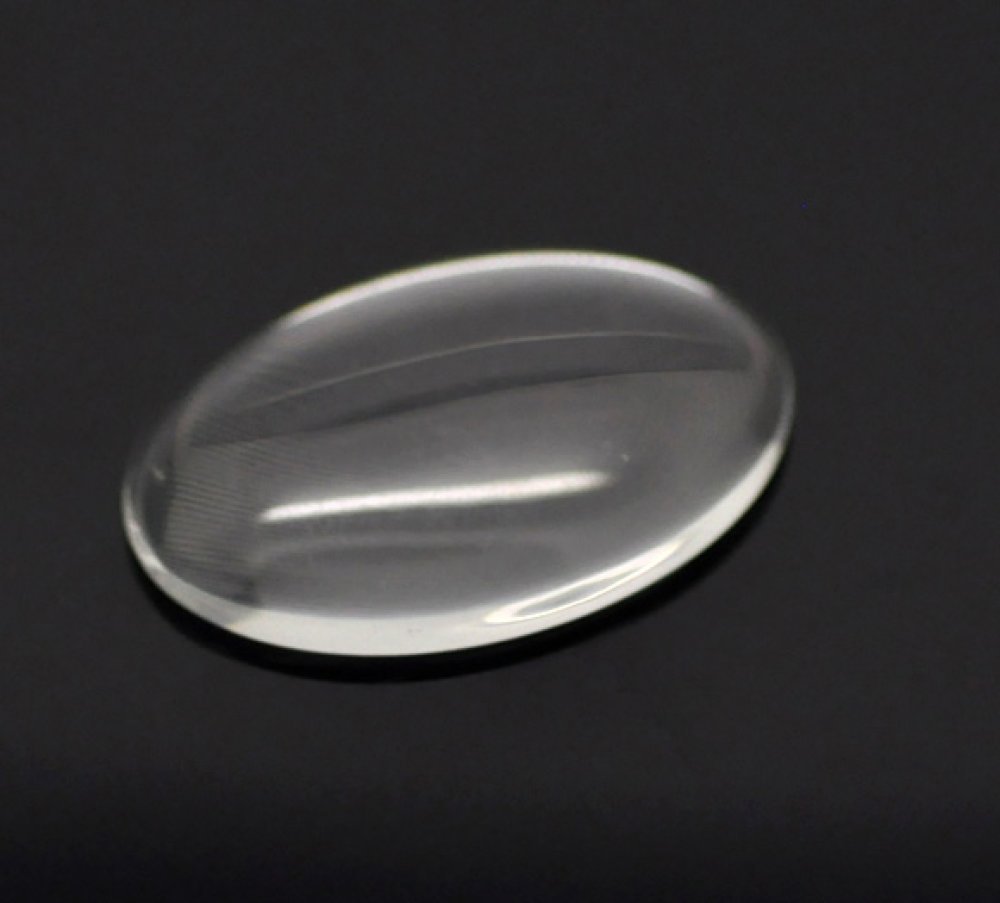 Oval cabochon 25 x 35 mm in clear burr glass N°20