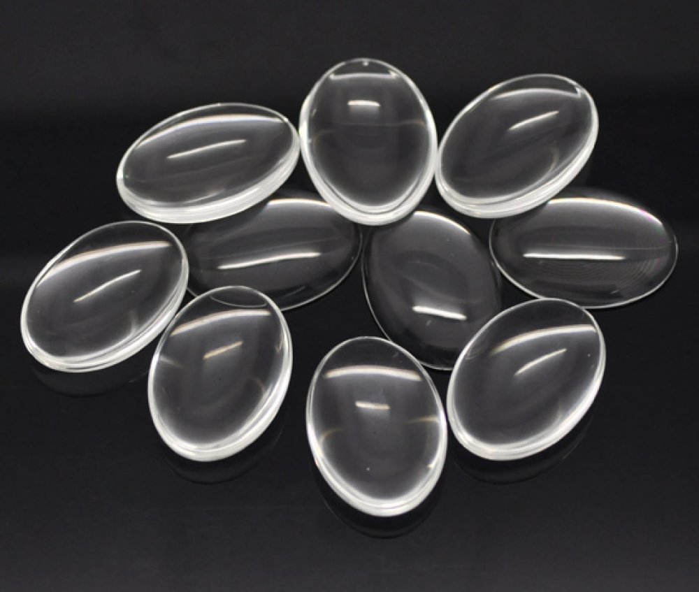 Oval cabochon 25 x 35 mm in clear burr glass N°20