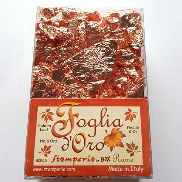 Gold leaves in stamp&eacute;ria flakes