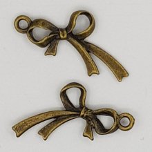 Charm bow tie N°07 Charm bow tie ribbon metal bronze