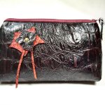 Makeup bag crocodile style leather.