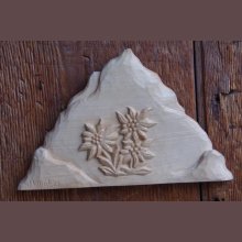 Mountain with hand carved edelweiss