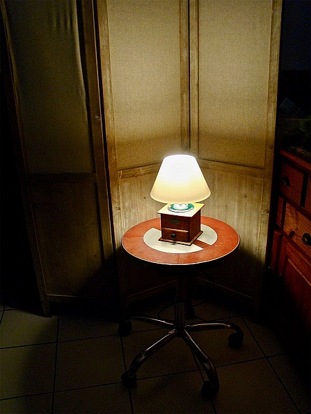 Old green coffee grinder lamp