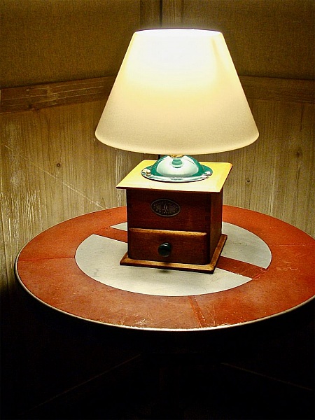 Old green coffee grinder lamp