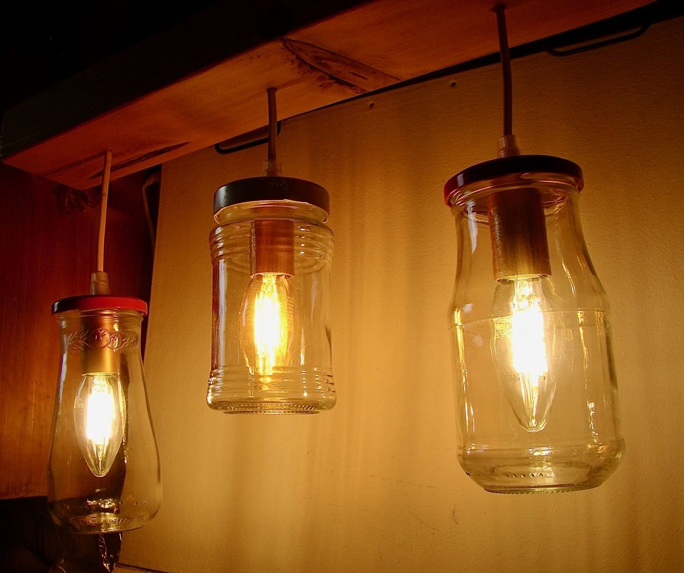 Small chandelier with recycled jars and wood.