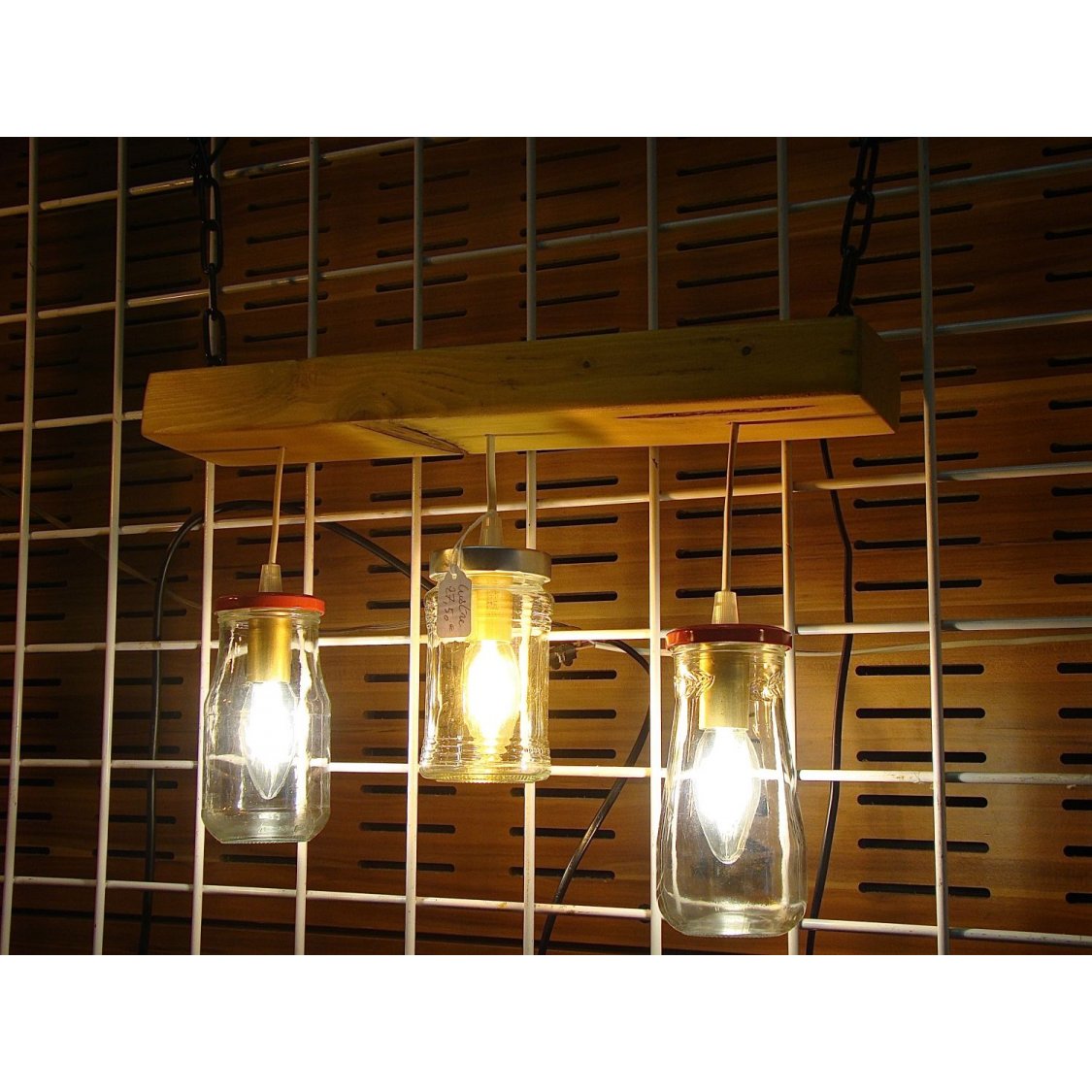 Small chandelier with recycled jars and wood.