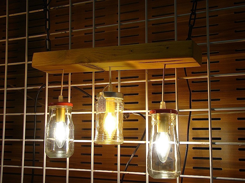 Small chandelier with recycled jars and wood.