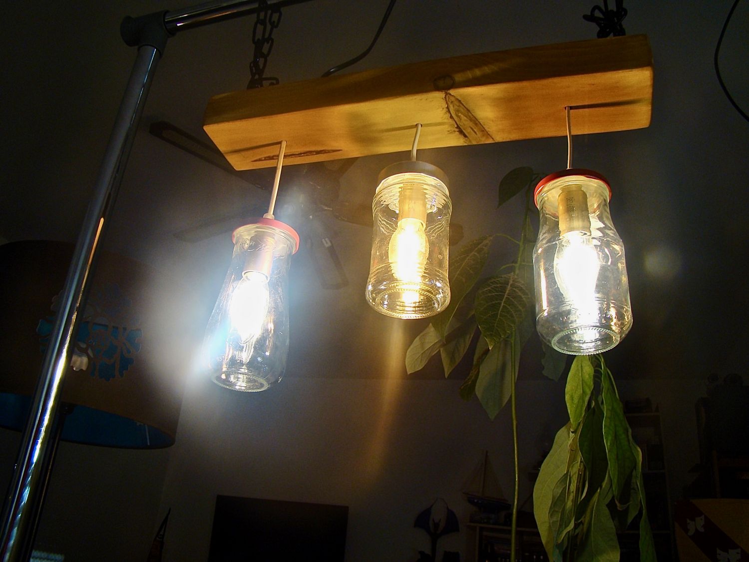 Small chandelier with recycled jars and wood.