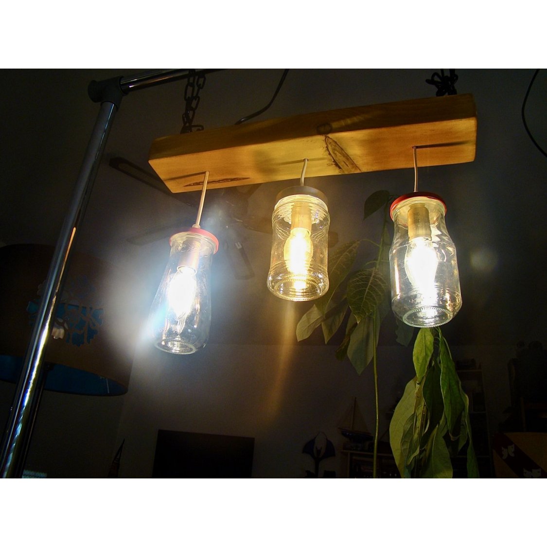 Small chandelier with recycled jars and wood.