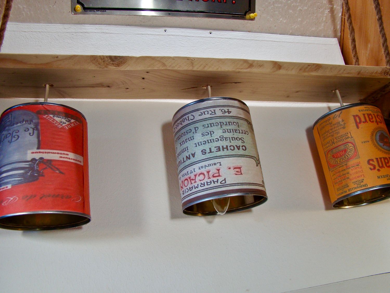 Wooden chandelier and vintage tin can 