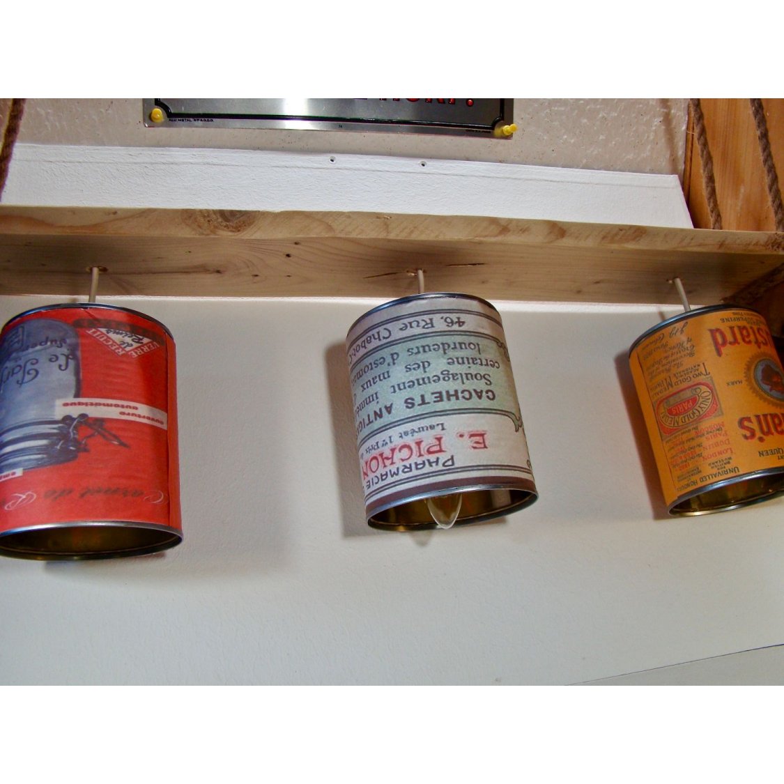 Wooden chandelier and vintage tin can 