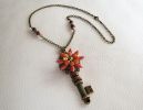 Pendant necklace Key and flowers in pearls on chain