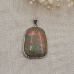 Cabochon pendant set in unakite stone round rectangular shape