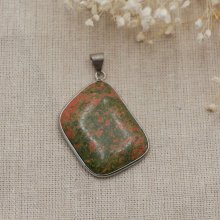 Cabochon pendant set in unakite stone 