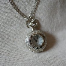 Round silver plated watch pendant on chain