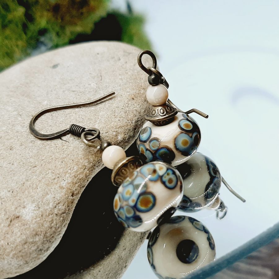 original fancy earrings with a handmade beige and bronze rakue effect glass bead