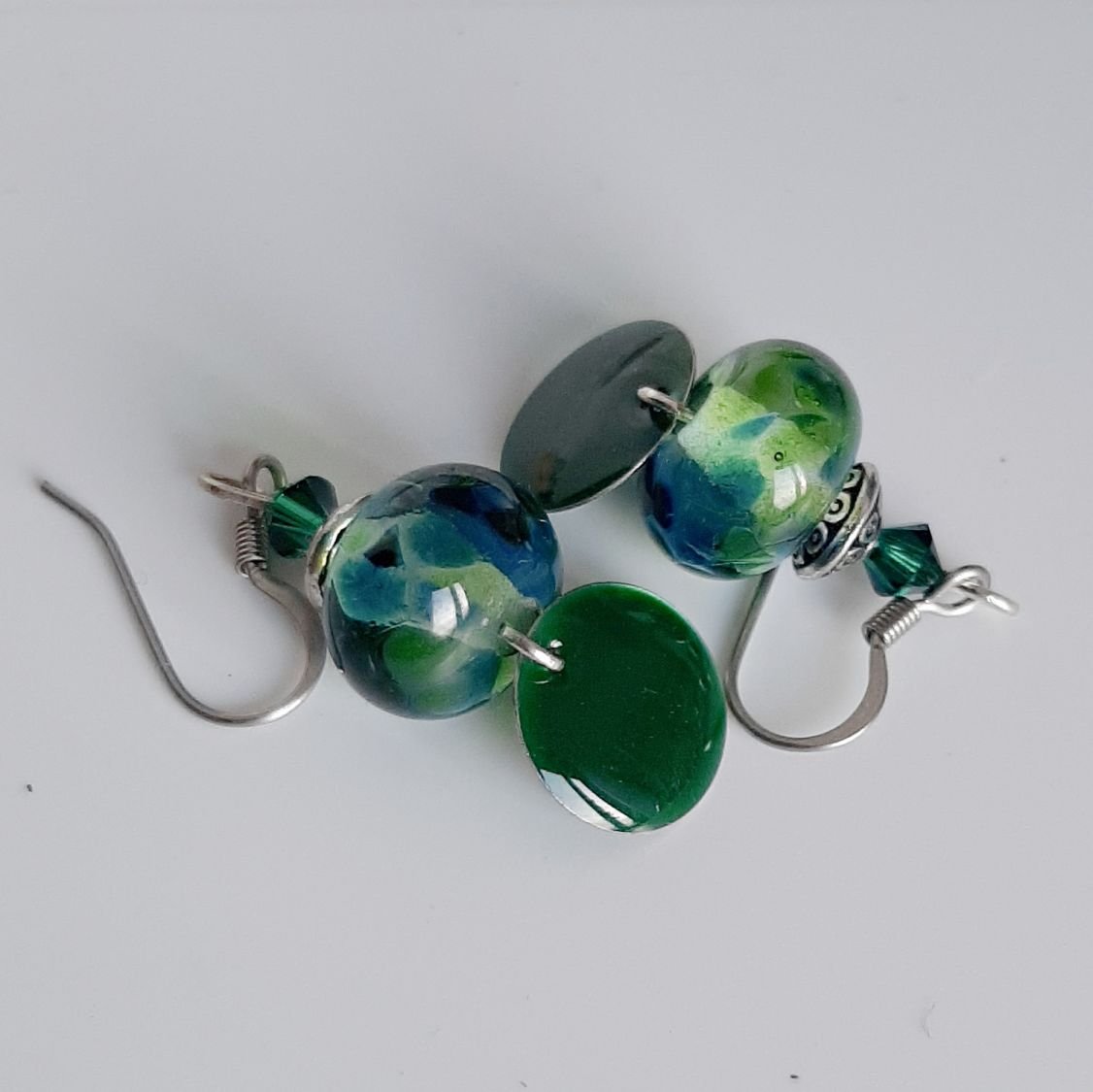 dark green earrings for pierced ears with handmade spun glass pendant