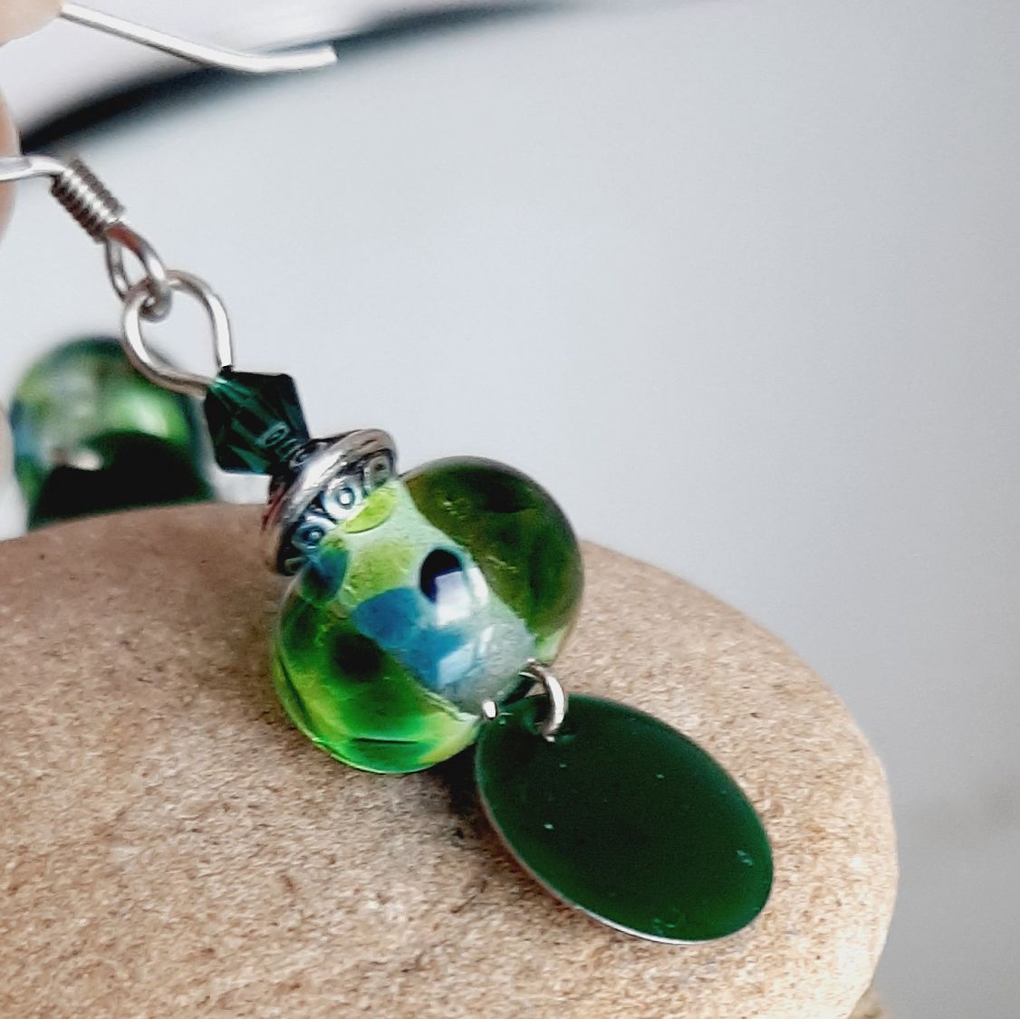 dark green earrings for pierced ears with handmade spun glass pendant