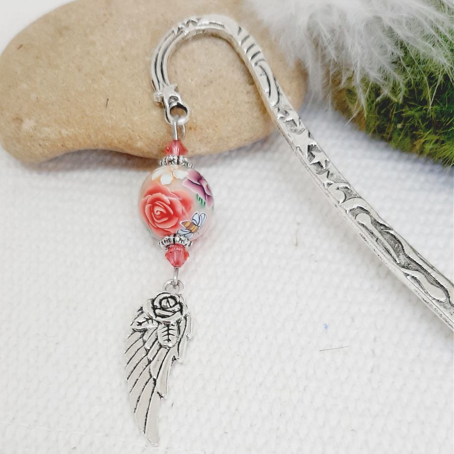 bookmark with silver angel wing and flower bead with pretty pink