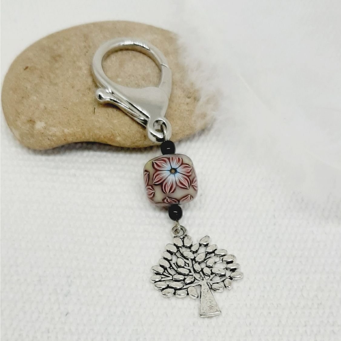 silver keychain with tree of life symbol and original handmade tonneua bead