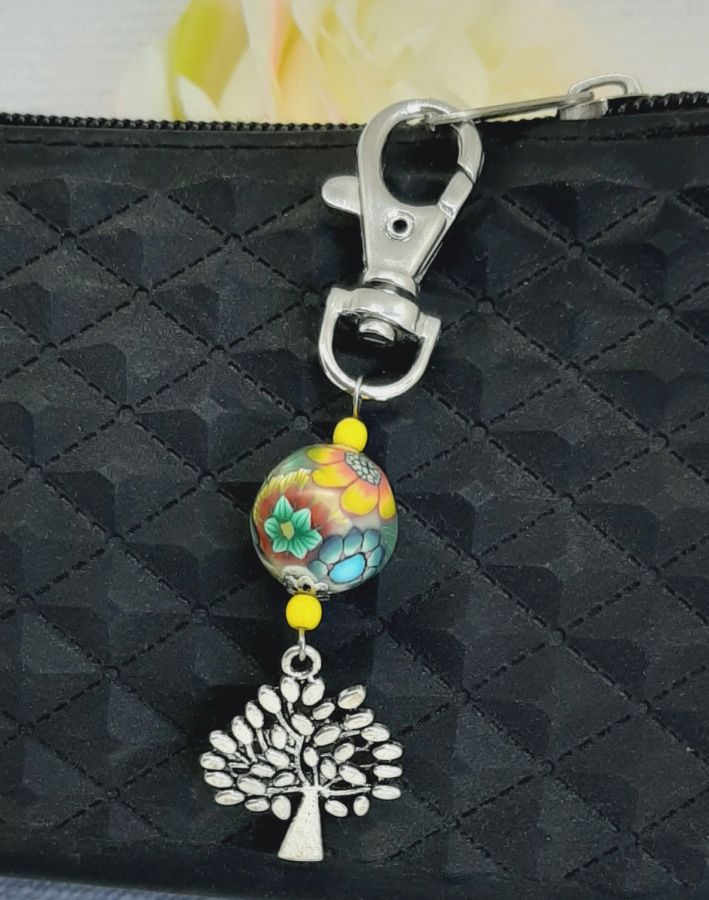 silver keychain with tree of life symbol and multicolored handmade pearl