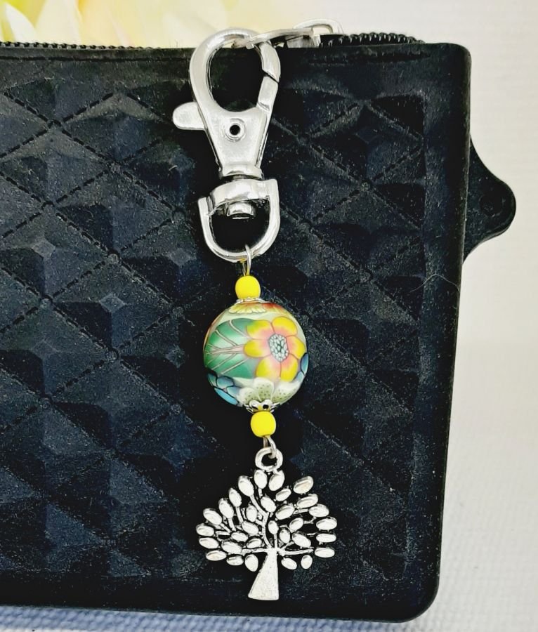 silver keychain with tree of life symbol and multicolored handmade pearl