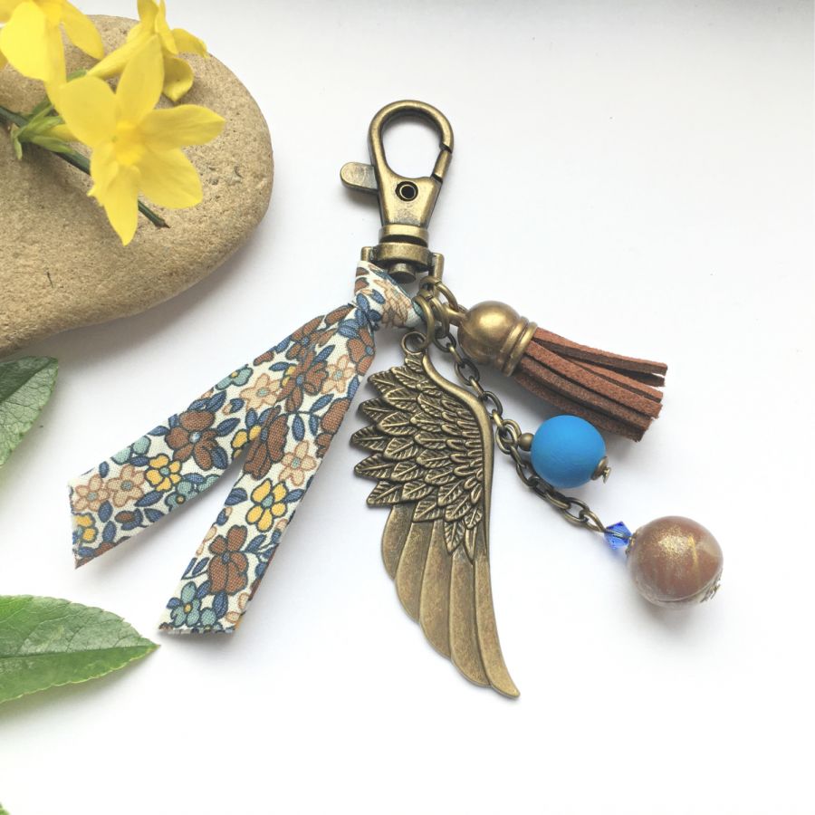 Keychain or bag jewel with angel wing pendant bronze color brown and blue 