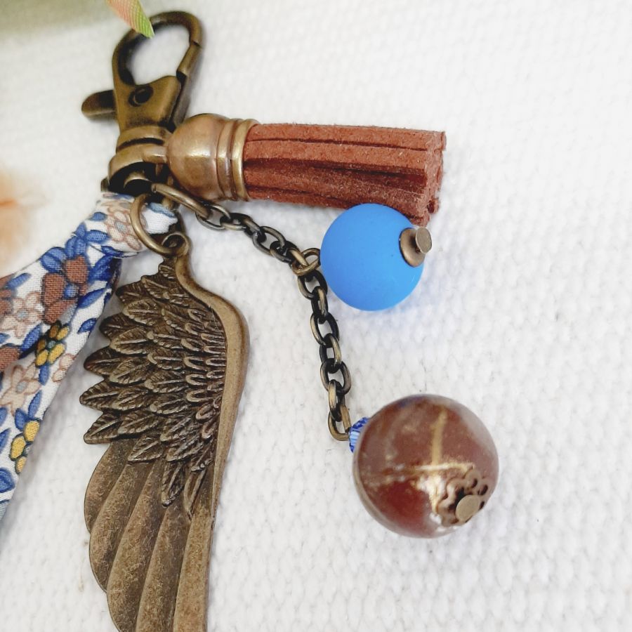 Keychain or bag jewel with angel wing pendant bronze color brown and blue 