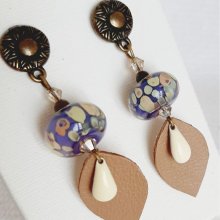 designer dangling earrings with handmade glass bead and handmade leather leaf