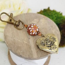 pedentific keychain photo holder and bead in brown polymer clay and white floweraet 