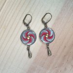 Red spiral dangling earrings