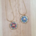 Necklace with pink or blue flowers on gold chain