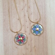 Necklace with pink or blue flowers on gold chain