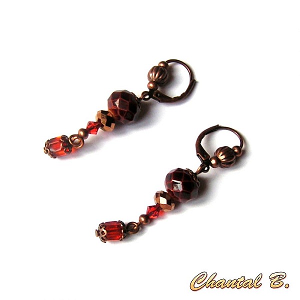 boucles d'oreilles dormeuses bronze perles facett&eacute;es verre cuivr&eacute; et perles swarovski orange