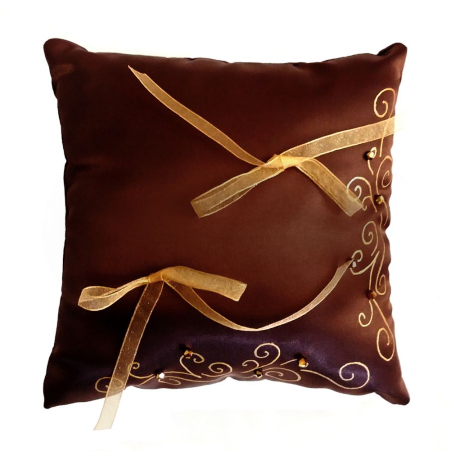 chocolate wedding cushion with arabesques and golden crystals