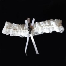 White lace wedding garters with music theme