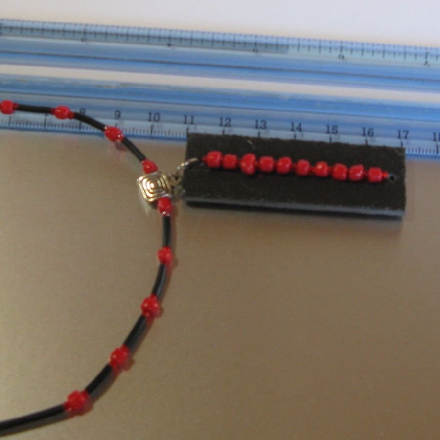 Necklace for Woman in Slate and Red pearls mounted on a black silicon cord, Unique Creation