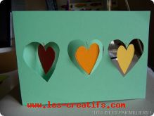 Card with hanging hearts