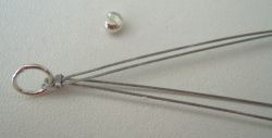 Making a pearl hair clip: step 1