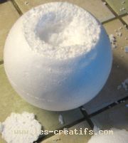 Cut and hollow out the polystyrene ball