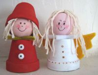 Christmas figures in earthenware pots