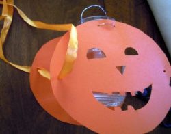 Pumpkin lantern with orange ribbons