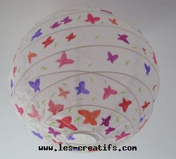 Paper ball chandelier decorated with butterflies