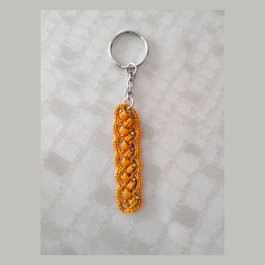 Gold mustard" small pearl key ring