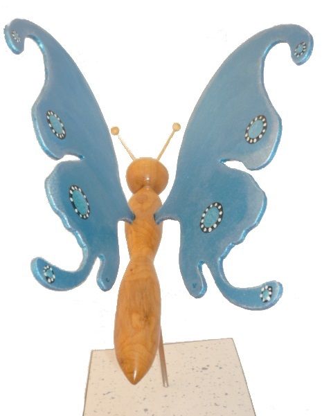 Electric blue butterfly on a stand wood sculpture