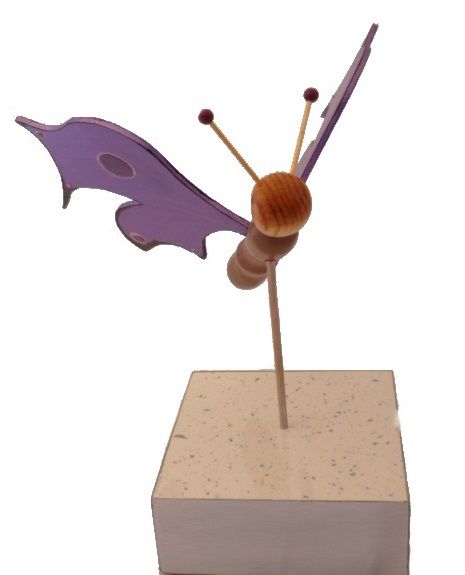 Electric purple butterfly on a stand wood sculpture