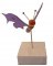 Electric purple butterfly on a stand wood sculpture