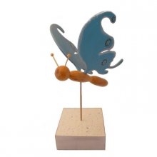 Electric blue butterfly on a stand wood sculpture