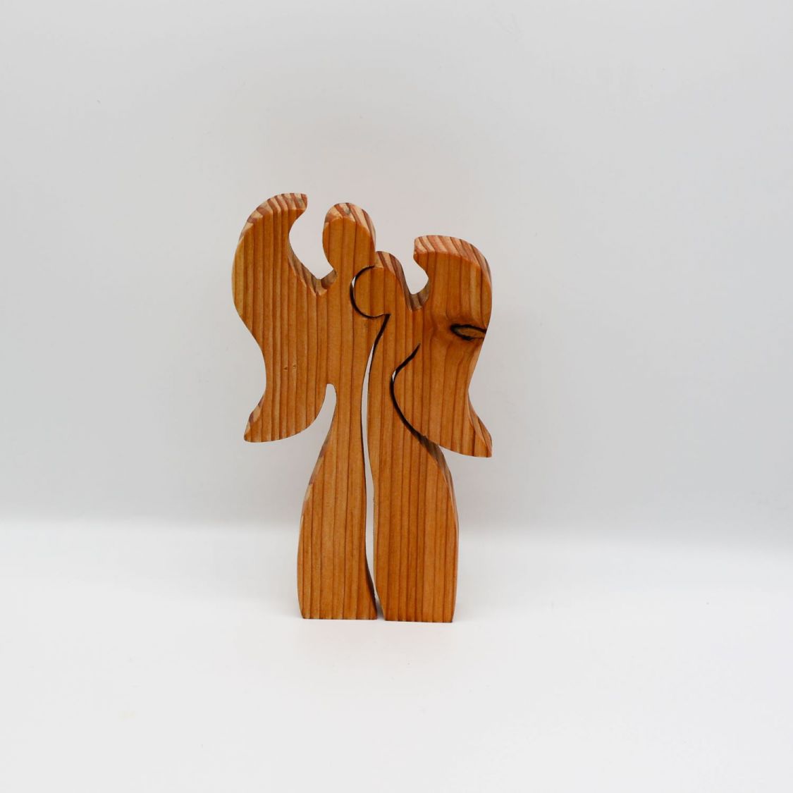 Couple of 2 angels embracing
